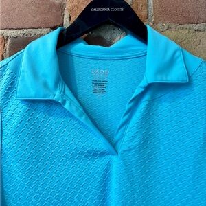 Women’s IZOD Turquoise Golf Shirt. Size: Large